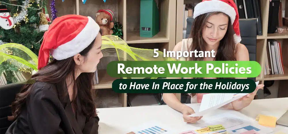 Office colleagues discussing while wearing festive Christmas hats